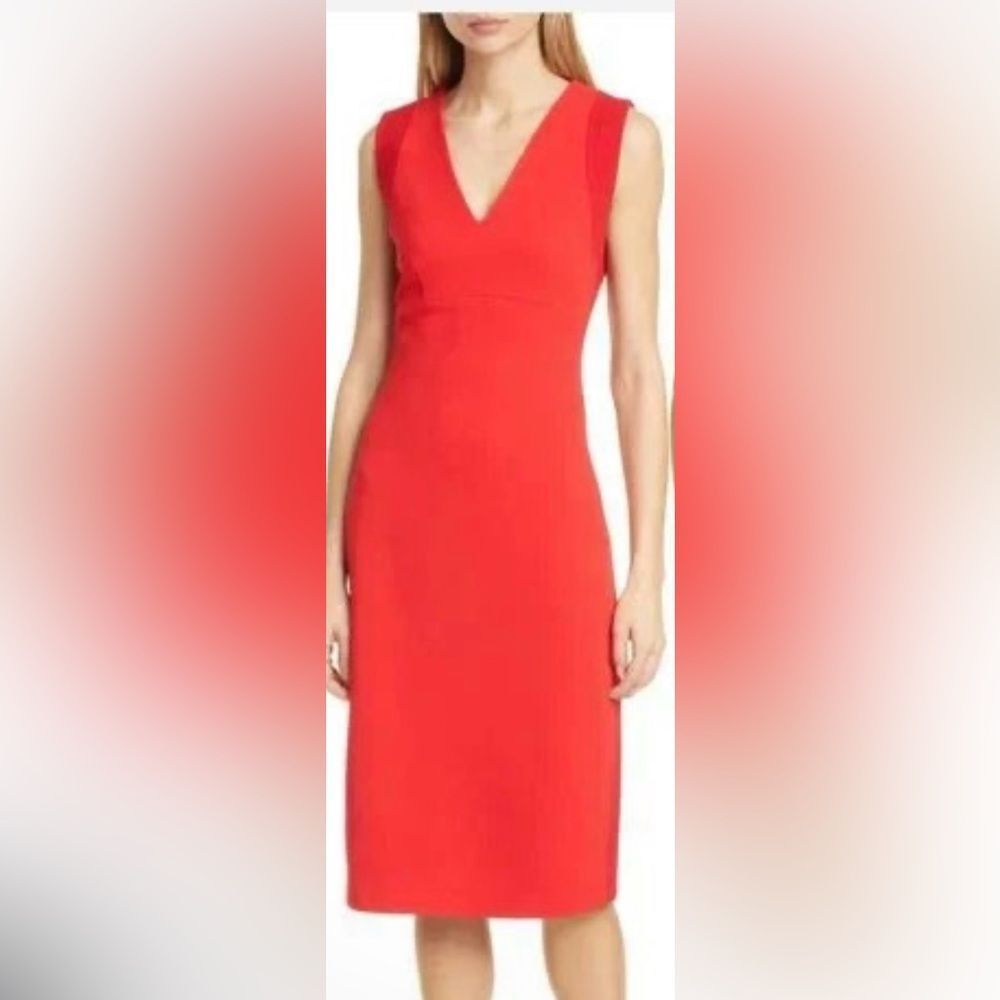 Fire engine red Size 8 Ann Taylor V neck sheath. Zip back button closure.